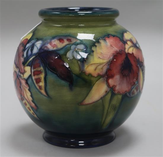 A Moorcroft green orchids vase